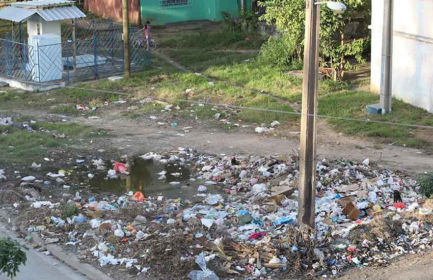 Hundreds of micro-dumps add to a smelly landscape.