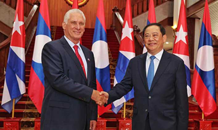 Thongloun Sisoulith, Lao People's Democratic Republic, received Miguel Díaz-Canel Bermúdez.