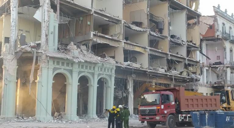 Rescuers continue to look of five missing persons in the ruins of the Saratoga Hotel