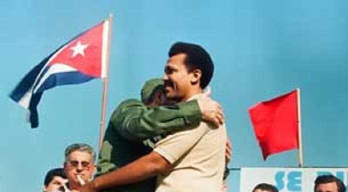 Fidel embraces Pedro Jiménez, who was then the first secretary of the Communist Party of Cuba in the southern municipality. 
