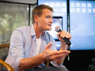 Charles Dewees attends an activity about Chinese online literature in Paris, France. 