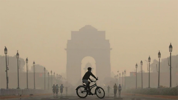Aire contaminacion nino bicicleta